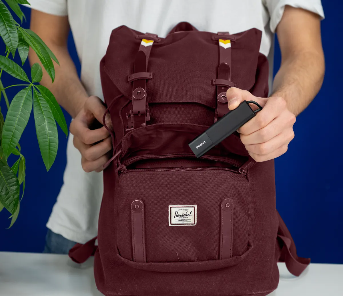 a Tracker GPS Pro placed inside a loved one’s backpack