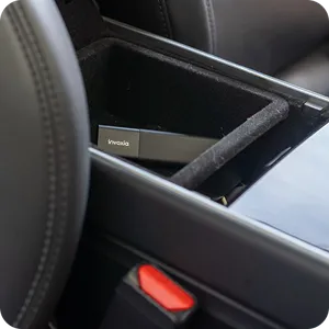 A Classic GPS Tracker hidden in the central console of a car