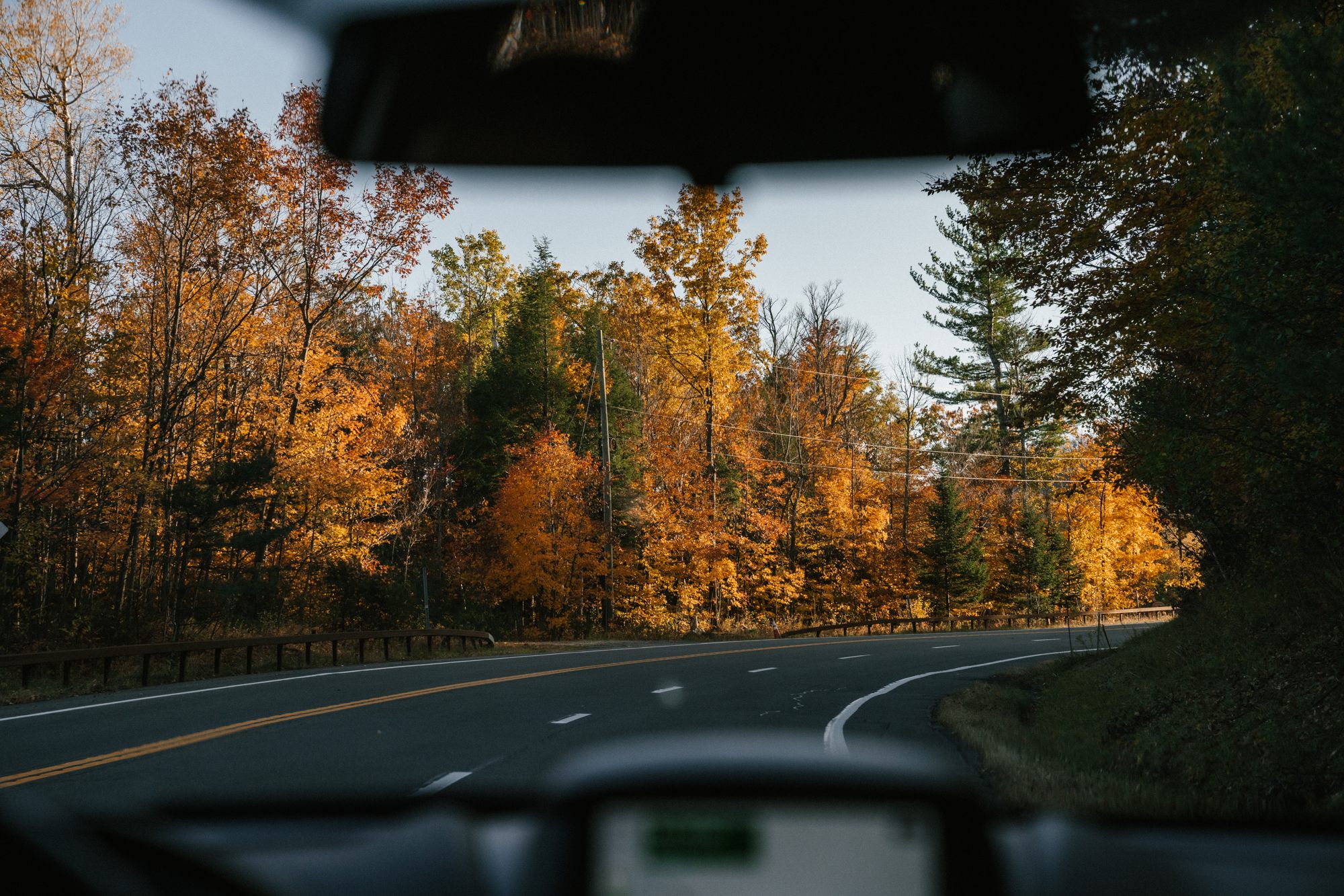 Image 3: a car driving on a highway