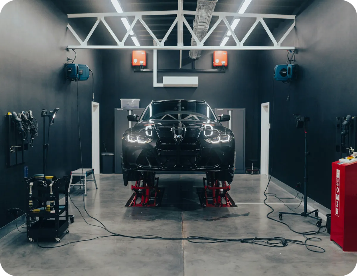 Car GPS tracker in a garage